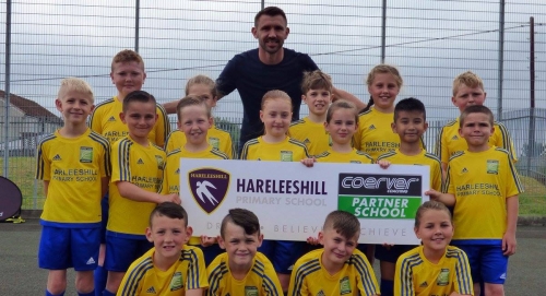 Euro 2016 scorer and Premiership footballer Gareth McAuley launches the first ever Coerver® Partner School at Hareleeshill Primary School in South Lanarkshire